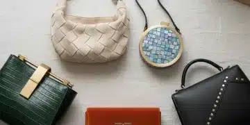 Collection of five unique handbags from emerging designers, showcasing diverse styles and luxury craftsmanship, with a subtle calendar indicating June 2026.